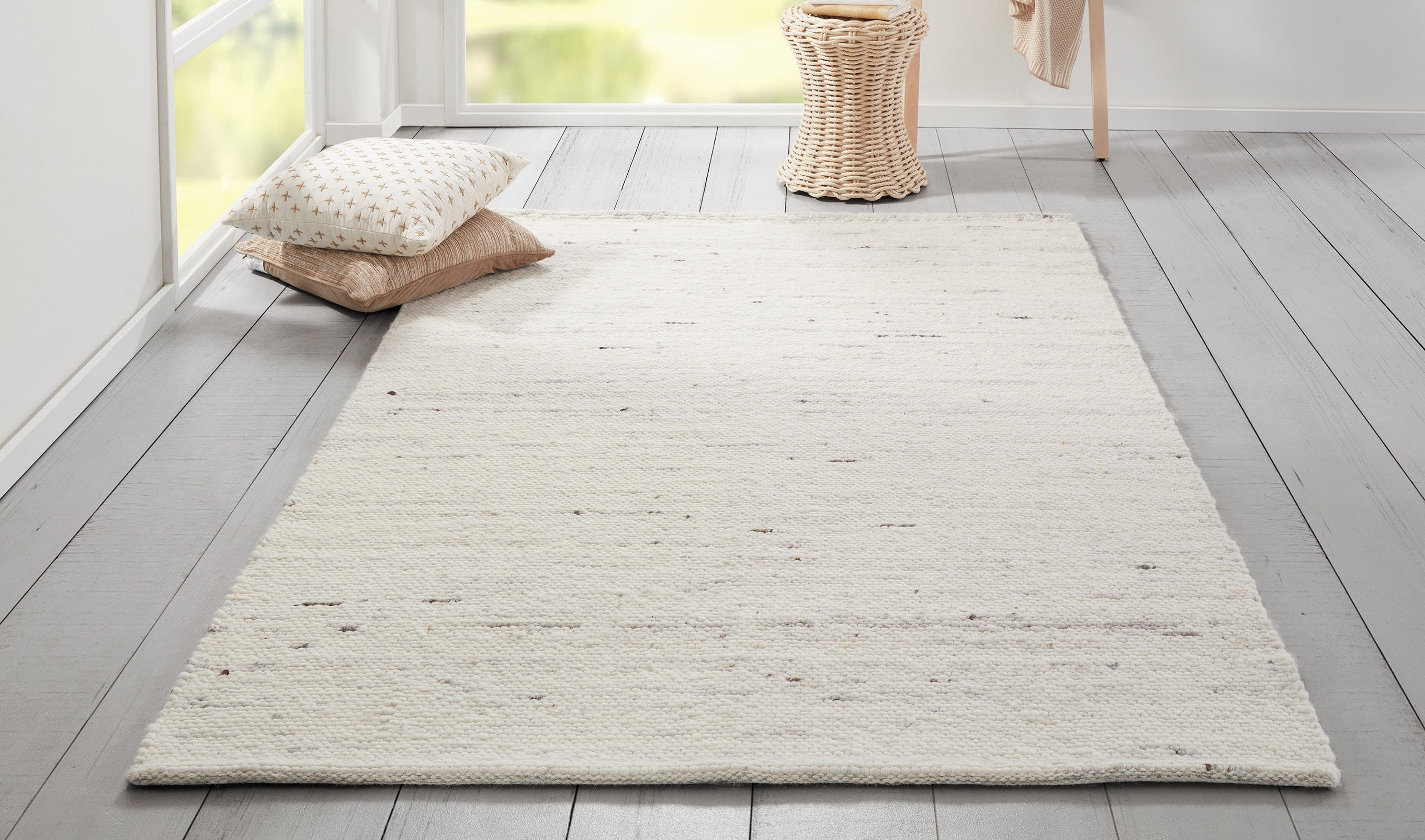 Erin Gates by Momeni Richmond Rug Collection: ivory-gray hand-woven rug with subtle striations on a light floor.