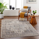  Aida area rug collection by LIVABLISS, a perfect addition to any home. This machine-woven rug is made from durable polyester and features an elegant, updated traditional style with chic fringe detailing.