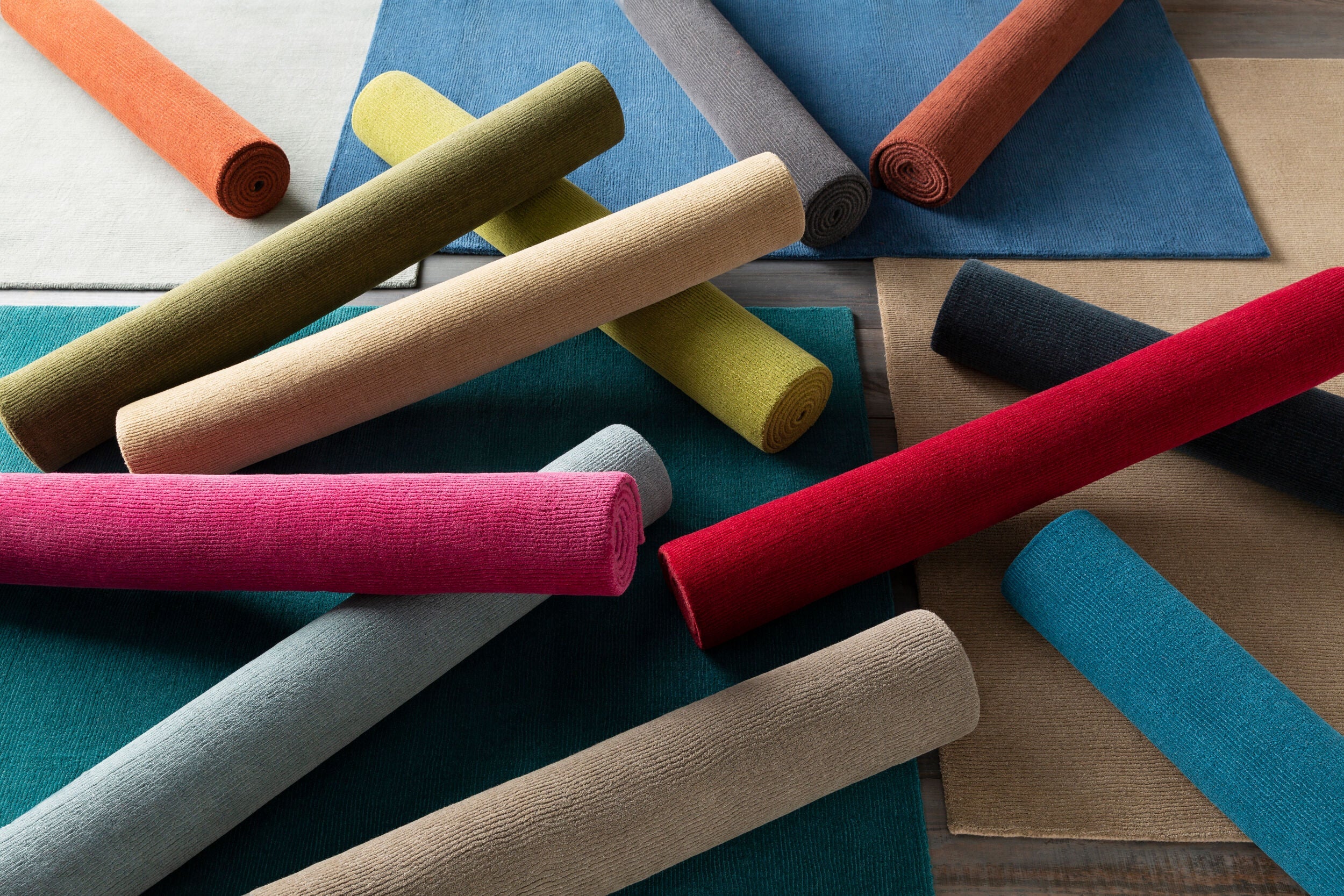 Premium rugs by Momeni, Loloi, LIVABLISS, and Couristan offer unique designer collaborations and blend classic, global, and bohemian styles for any home.