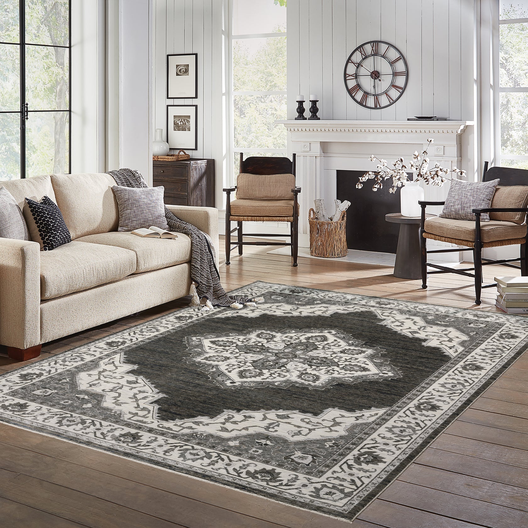 The Oriental Weavers Chamberlain collection area rug features a dense, low-profile design crafted with precision. Made from soft, space-dyed polyester yarns, it showcases a beautiful palette of neutral tones, from deep charcoal to gentle ivory.