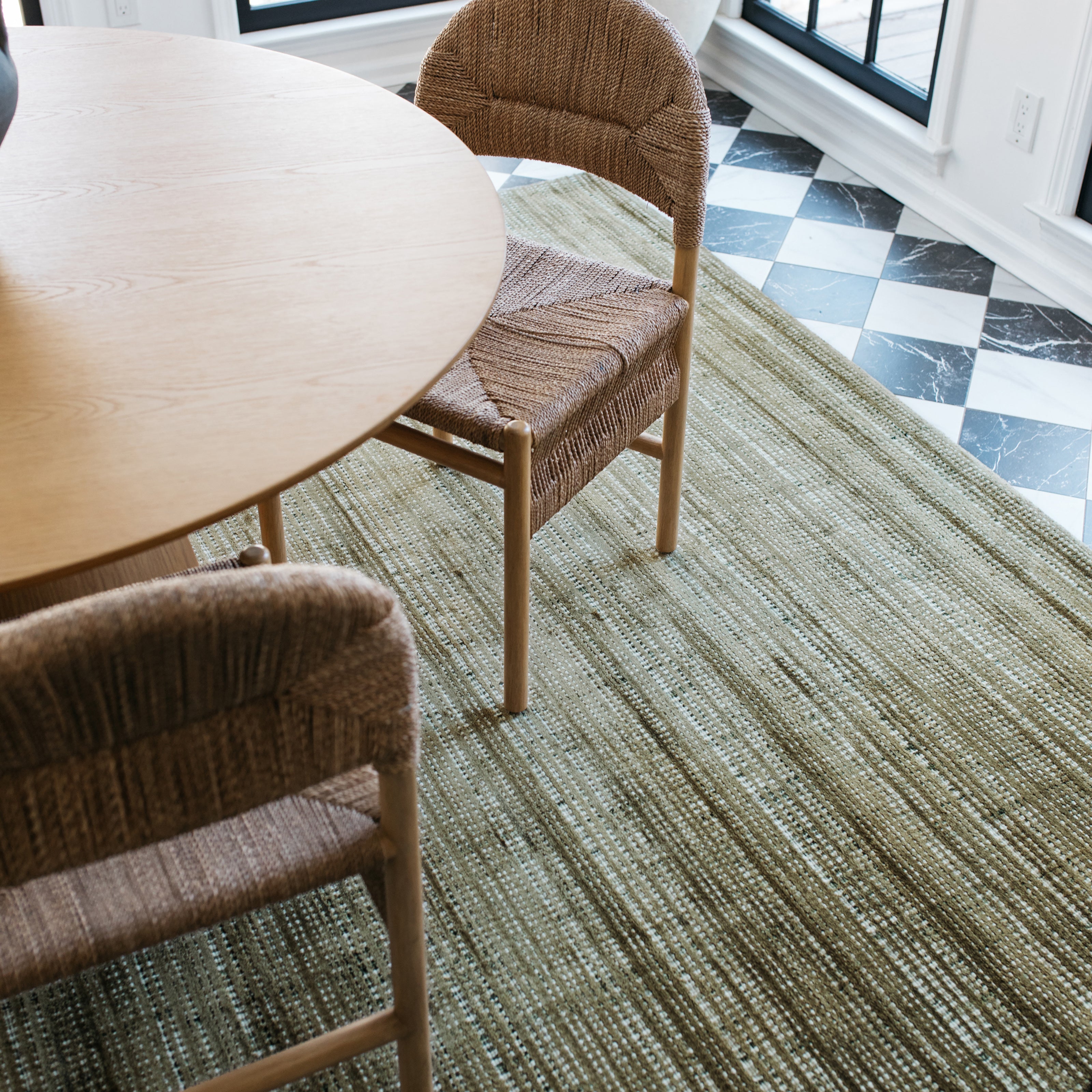 Oriental Weavers Circa collection, meticulously hand-tufted for a luxurious feel with its plush viscose pile and a uniquely textured background crafted from space-dyed wool.