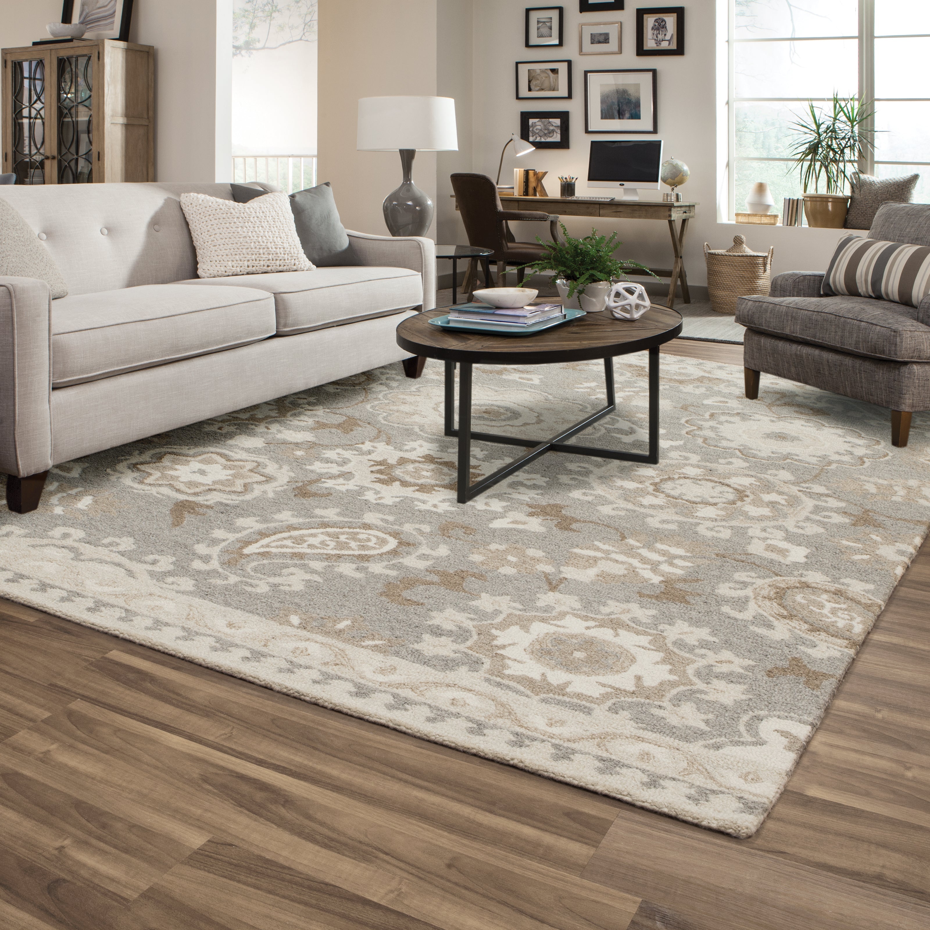  Craft collection area rug by Oriental Weavers, showcasing the exquisite beauty of 100% natural, undyed wool in stunning shades of ivory, sand, heathered gray, and taupe. 