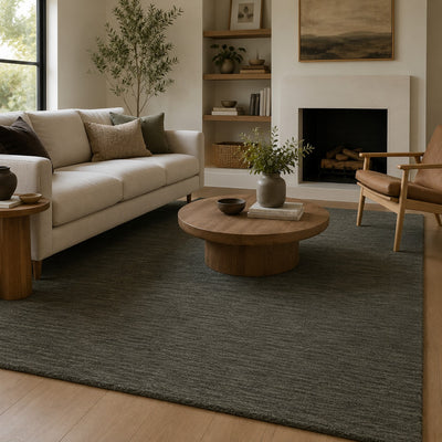 Aniston 27102 Charcoal Area Rug, charcoal solid wool area rug with heathered texture and tailored handwoven surface.