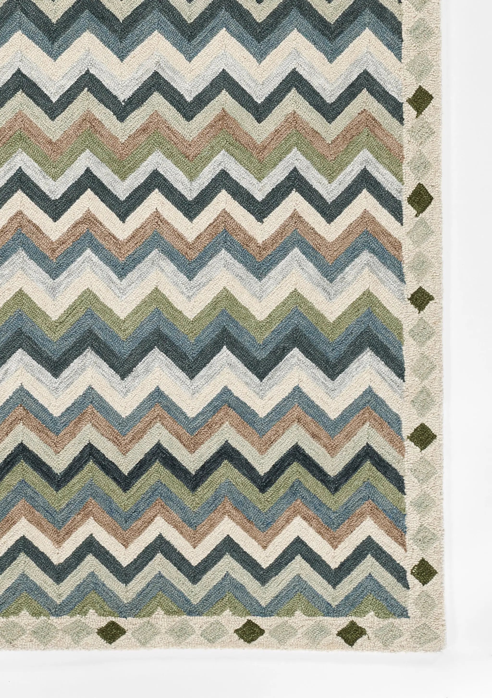 Erin Gates by Momeni Abbot ABB-1 Blue chevron wool area rug featuring earthy green, brown, and cream zigzag stripes with a diamond-patterned border.