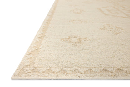The Alara ALR-02 Ivory / Natural Area Rug delivers refined ivory and warm natural beauty in a hand-woven wool area rug