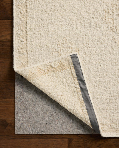 The Alara ALR-02 Ivory / Natural Area Rug delivers refined ivory and warm natural beauty in a hand-woven wool area rug
