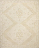 Designed in refined ivory and warm natural hues, the Alara ALR-03 Ivory / Natural Area Rug is a hand-woven wool area rug that stands out