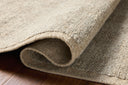 A hand-woven wool area rug with gentle dove tones, the Alina ALN-01 Dove Area Rug adds character to any room
