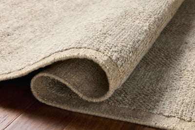 A hand-woven wool area rug with gentle dove tones, the Alina ALN-01 Dove Area Rug adds character to any room