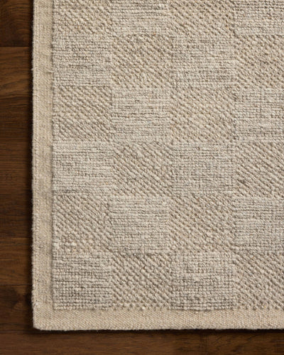 A hand-woven wool area rug with gentle dove tones, the Alina ALN-01 Dove Area Rug adds character to any room