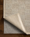 A hand-woven wool area rug with gentle dove tones, the Alina ALN-01 Dove Area Rug adds character to any room