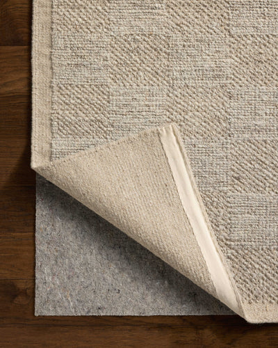 A hand-woven wool area rug with gentle dove tones, the Alina ALN-01 Dove Area Rug adds character to any room
