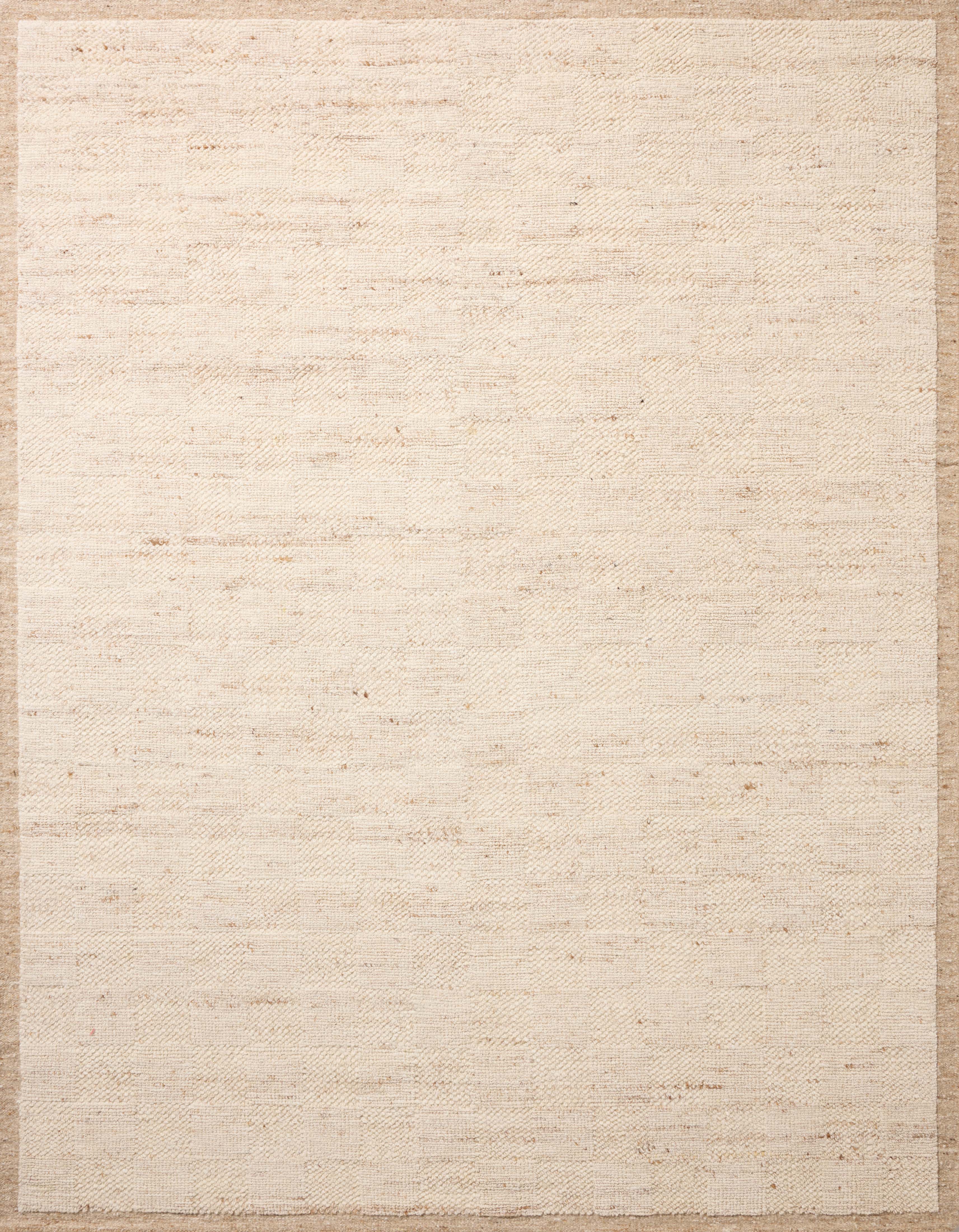 Rich in warm natural hues, the Alina ALN-01 Natural Area Rug is a hand-woven wool area rug built for style and comfort