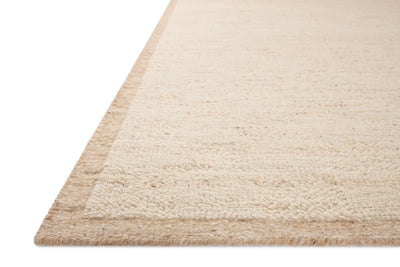 Rich in warm natural hues, the Alina ALN-01 Natural Area Rug is a hand-woven wool area rug built for style and comfort