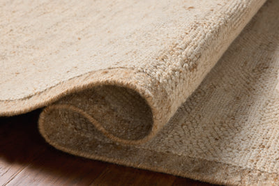 Rich in warm natural hues, the Alina ALN-01 Natural Area Rug is a hand-woven wool area rug built for style and comfort