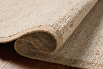 Rich in warm natural hues, the Alina ALN-01 Natural Area Rug is a hand-woven wool area rug built for style and comfort