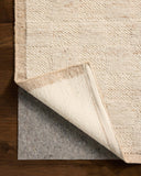 Rich in warm natural hues, the Alina ALN-01 Natural Area Rug is a hand-woven wool area rug built for style and comfort