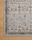 A power-loomed polyester area rug in refined ivory and grounding stone tones with traditional and distressed motifs, the Anniston ANS-01 Ivory / Stone Area Rug grounds your room beautifully