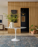 The Anniston ANS-02 Lagoon / Natural Area Rug is a power-loomed polyester area rug that radiates tranquil lagoon and warm natural charm and traditional and distressed elegance