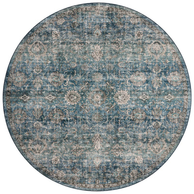 The Anniston ANS-02 Lagoon / Natural Area Rug is a power-loomed polyester area rug that radiates tranquil lagoon and warm natural charm and traditional and distressed elegance