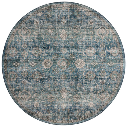 The Anniston ANS-02 Lagoon / Natural Area Rug is a power-loomed polyester area rug that radiates tranquil lagoon and warm natural charm and traditional and distressed elegance