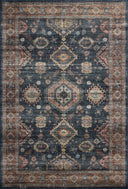 Layered in casual denim and glowing sunset hues with traditional and distressed patterns, the Anniston ANS-03 Denim / Sunset Area Rug is a power-loomed polyester area rug perfect for any setting