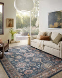 Layered in casual denim and glowing sunset hues with traditional and distressed patterns, the Anniston ANS-03 Denim / Sunset Area Rug is a power-loomed polyester area rug perfect for any setting