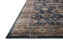 Layered in casual denim and glowing sunset hues with traditional and distressed patterns, the Anniston ANS-03 Denim / Sunset Area Rug is a power-loomed polyester area rug perfect for any setting