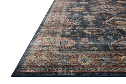 Layered in casual denim and glowing sunset hues with traditional and distressed patterns, the Anniston ANS-03 Denim / Sunset Area Rug is a power-loomed polyester area rug perfect for any setting