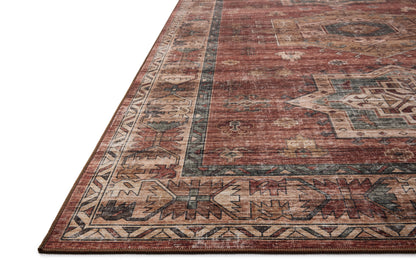 The Anniston ANS-04 Spice / Multi Area Rug showcases spirited spice and vibrant multi-toned tones in a power-loomed polyester area rug with traditional and distressed style