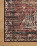 The Anniston ANS-04 Spice / Multi Area Rug showcases spirited spice and vibrant multi-toned tones in a power-loomed polyester area rug with traditional and distressed style