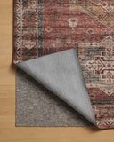 The Anniston ANS-04 Spice / Multi Area Rug showcases spirited spice and vibrant multi-toned tones in a power-loomed polyester area rug with traditional and distressed style