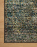 Featuring tranquil lagoon and vibrant multi-toned hues and traditional and distressed detail, the Anniston ANS-05 Lagoon / Multi Area Rug is a power-loomed polyester area rug for any room