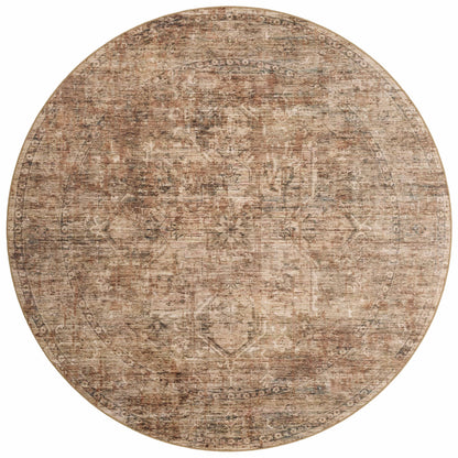 A power-loomed polyester area rug with traditional and distressed flair in earthy clay and deep charcoal tones, the Anniston ANS-06 Clay / Charcoal Area Rug anchors any room