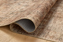 A power-loomed polyester area rug with traditional and distressed flair in earthy clay and deep charcoal tones, the Anniston ANS-06 Clay / Charcoal Area Rug anchors any room