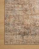 A power-loomed polyester area rug with traditional and distressed flair in earthy clay and deep charcoal tones, the Anniston ANS-06 Clay / Charcoal Area Rug anchors any room