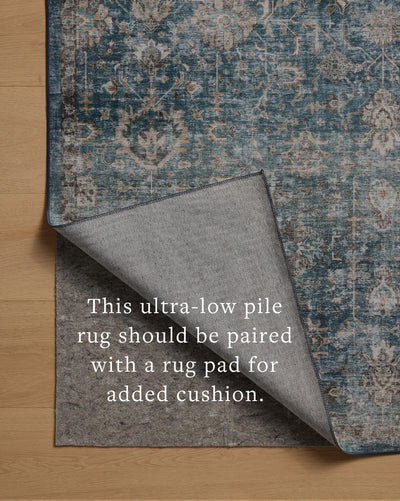 The Anniston ANS-02 Lagoon / Natural Area Rug is a power-loomed polyester area rug that radiates tranquil lagoon and warm natural charm and traditional and distressed elegance