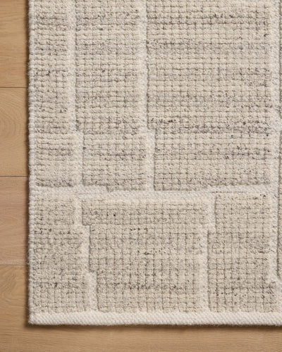 Featuring gentle dove hues and contemporary detail, the Asha ASA-01 Dove Area Rug is a hand-loomed wool and cotton area rug for any room