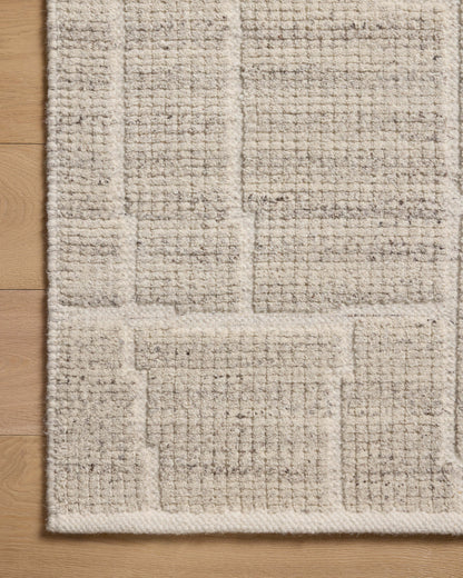 Featuring gentle dove hues and contemporary detail, the Asha ASA-01 Dove Area Rug is a hand-loomed wool and cotton area rug for any room