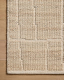 A hand-loomed wool and cotton area rug with contemporary flair in warm natural tones, the Asha ASA-01 Natural Area Rug anchors any room