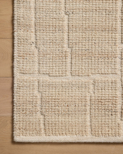 A hand-loomed wool and cotton area rug with contemporary flair in warm natural tones, the Asha ASA-01 Natural Area Rug anchors any room
