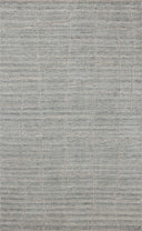 The Asha ASA-01 Sky Area Rug pairs breezy sky-blue tones and contemporary patterns in a hand-loomed wool and cotton area rug