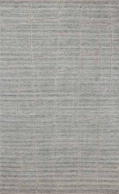 The Asha ASA-01 Sky Area Rug pairs breezy sky-blue tones and contemporary patterns in a hand-loomed wool and cotton area rug