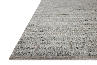 The Asha ASA-01 Sky Area Rug pairs breezy sky-blue tones and contemporary patterns in a hand-loomed wool and cotton area rug