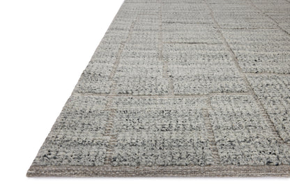 The Asha ASA-01 Sky Area Rug pairs breezy sky-blue tones and contemporary patterns in a hand-loomed wool and cotton area rug