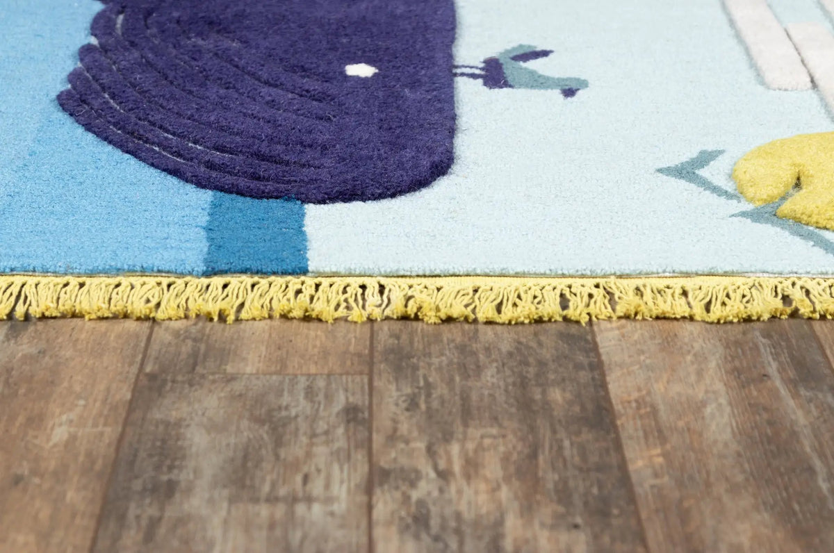 Atticus ATC-2 (Whale) Blue Area Rug by Novogratz by Momeni