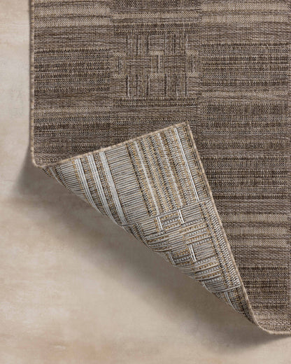 Rich in warm natural and warm beige hues with contemporary and linear detail, the Birch BIR-01 Natural / Beige Area Rug is a power-loomed polypropylene area rug built for style and comfort