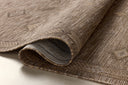 Finished in warm natural and sandy tones with contemporary and linear styling, the Birch BIR-03 Natural / Sand Area Rug is a power-loomed polypropylene area rug for modern living