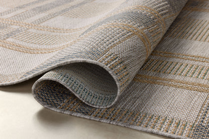The Birch BIR-05 Bone / Gold Area Rug highlights bone and radiant gold tones and contemporary and linear texture in a beautifully made power-loomed polypropylene area rug