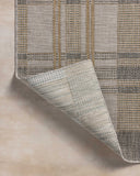 The Birch BIR-05 Bone / Gold Area Rug highlights bone and radiant gold tones and contemporary and linear texture in a beautifully made power-loomed polypropylene area rug